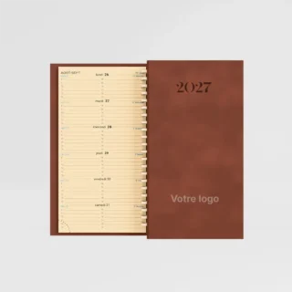 agenda de poche winner metal rouille sur fond gris